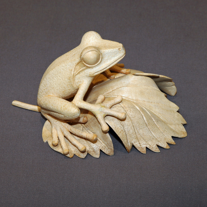 antique frog statuette